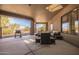 Covered patio with seating area and grill at 16738 E Lone Mountain Rd, Scottsdale, AZ 85262