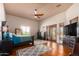 Spacious main bedroom with hardwood floors and access to backyard at 16738 E Lone Mountain Rd, Scottsdale, AZ 85262