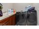 Laundry room with Samsung washer and dryer at 16738 E Lone Mountain Rd, Scottsdale, AZ 85262