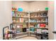 Well-stocked pantry with ample shelving for storage at 16738 E Lone Mountain Rd, Scottsdale, AZ 85262