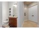 Clean bathroom with a single vanity and toilet at 16738 E Lone Mountain Rd, Scottsdale, AZ 85262