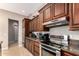 Kitchen with stainless steel appliances and granite countertops at 16738 E Lone Mountain Rd, Scottsdale, AZ 85262