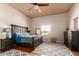 Bright bedroom with a queen-size bed and large window offering a view at 16738 E Lone Mountain Rd, Scottsdale, AZ 85262