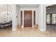 Bright and spacious entryway with tile flooring and access to dining area at 16738 E Lone Mountain Rd, Scottsdale, AZ 85262
