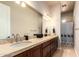 Elegant bathroom with double sinks, a shower, and plenty of storage at 16738 E Lone Mountain Rd, Scottsdale, AZ 85262