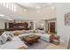 Spacious living room with large sectional sofa and high ceilings at 16738 E Lone Mountain Rd, Scottsdale, AZ 85262