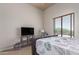 Bedroom with a comfortable bed and a flat screen TV at 16738 E Lone Mountain Rd, Scottsdale, AZ 85262
