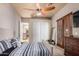 Bedroom with large closet and access to the kitchen at 16738 E Lone Mountain Rd, Scottsdale, AZ 85262