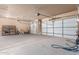 Spacious two-car garage with storage shelving at 16738 E Lone Mountain Rd, Scottsdale, AZ 85262