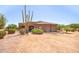 Southwest style house with a large cactus in front of the property at 16738 E Lone Mountain Rd, Scottsdale, AZ 85262