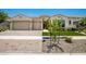 Beautiful two-car garage home with landscaped yard at 9649 E Solina Ave, Mesa, AZ 85212