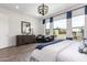 Bright and airy main bedroom with large windows and sitting area at 9649 E Solina Ave, Mesa, AZ 85212