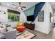 Stylish game room with geometric wall and cozy seating at 9649 E Solina Ave, Mesa, AZ 85212