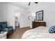 Serene bedroom with ensuite bathroom and plenty of natural light at 9649 E Solina Ave, Mesa, AZ 85212