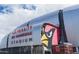 Exterior view of University of Phoenix Stadium showcasing its unique architecture and Arizona Cardinals logo at 6745 N 93Rd Ave # 1129, Glendale, AZ 85305