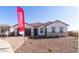 One-story home with a tile roof and attached garage at 23997 N 172Nd Ave, Surprise, AZ 85387