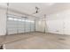 Garage with overhead door and ample space at 23997 N 172Nd Ave, Surprise, AZ 85387