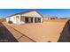 Back of house with a spacious yard at 23997 N 172Nd Ave, Surprise, AZ 85387