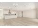 Spacious living room with sliding doors to backyard at 23997 N 172Nd Ave, Surprise, AZ 85387