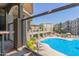Community pool and surrounding building view at 5350 E Deer Valley Dr # 4271, Phoenix, AZ 85054