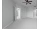 Spacious bedroom with ceiling fan and access to hallway at 5350 E Deer Valley Dr # 4271, Phoenix, AZ 85054
