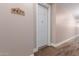Residential hallway with light walls and wood-look flooring at 5350 E Deer Valley Dr # 4271, Phoenix, AZ 85054