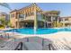 Inviting community pool with lounge chairs and a pergola at 5350 E Deer Valley Dr # 4271, Phoenix, AZ 85054