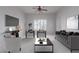 Living room with contemporary furniture, large TV, and ample natural light at 5350 E Deer Valley Dr # 4271, Phoenix, AZ 85054