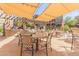 Outdoor BBQ area with tables, chairs, and shade structures at 5350 E Deer Valley Dr # 4271, Phoenix, AZ 85054