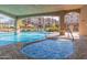 Resort-style pool and spa with covered seating and lounge chairs at 5350 E Deer Valley Dr # 4271, Phoenix, AZ 85054