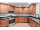 Updated kitchen, featuring granite countertops and wood cabinets at 5350 E Deer Valley Dr # 4271, Phoenix, AZ 85054