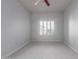 Well-lit bedroom featuring ceiling fan and window at 5350 E Deer Valley Dr # 4271, Phoenix, AZ 85054