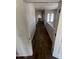 Long hallway with wood flooring, leading to other rooms at 7264 W Cielo Grande --, Peoria, AZ 85383
