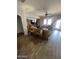 Living room offers hardwood floors, ample seating, and a large TV at 7264 W Cielo Grande --, Peoria, AZ 85383