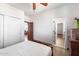 Cozy bedroom with wood floors and access to bathroom at 15027 N 28Th St, Phoenix, AZ 85032