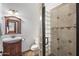 Bathroom features a glass-block shower and wood vanity at 15027 N 28Th St, Phoenix, AZ 85032