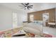 Bright bedroom with ensuite bathroom and stylish furniture at 19650 E Jeanna Ct, Queen Creek, AZ 85142