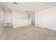 Upstairs hallway with access to bedrooms and ample natural light at 12902 N 127Th Ave, El Mirage, AZ 85335