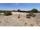 Aerial view of a desert property with a mobile home at 2249 W Daniel Rd, San Tan Valley, AZ 85144