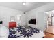 Bedroom with floral bedding and view of bathroom at 2209 W Adams St, Phoenix, AZ 85009