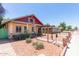 Charming bungalow home with red roof and landscaped front yard at 2209 W Adams St, Phoenix, AZ 85009