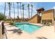 Inviting pool and spa area with lounge chairs at 4901 S Calle Los Cerros Dr # 267, Tempe, AZ 85282