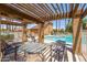 Relaxing patio area with pergola and seating at 4901 S Calle Los Cerros Dr # 267, Tempe, AZ 85282