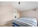 Spacious bedroom with a ceiling fan and large bed at 4901 S Calle Los Cerros Dr # 267, Tempe, AZ 85282
