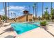 Community pool with surrounding lounge chairs at 4901 S Calle Los Cerros Dr # 267, Tempe, AZ 85282