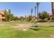 Landscaped community green space with picnic tables at 4901 S Calle Los Cerros Dr # 267, Tempe, AZ 85282