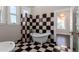 Stylish bathroom with black and white checkered floors at 819 S 3Rd Ave, Phoenix, AZ 85003