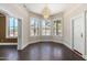 Spacious dining room with hardwood floors and large windows at 819 S 3Rd Ave, Phoenix, AZ 85003