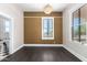 Dining room with dark hardwood floors and adjacent bathroom at 819 S 3Rd Ave, Phoenix, AZ 85003