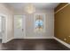 Elegant dining room with hardwood floors and stained-glass door at 819 S 3Rd Ave, Phoenix, AZ 85003
